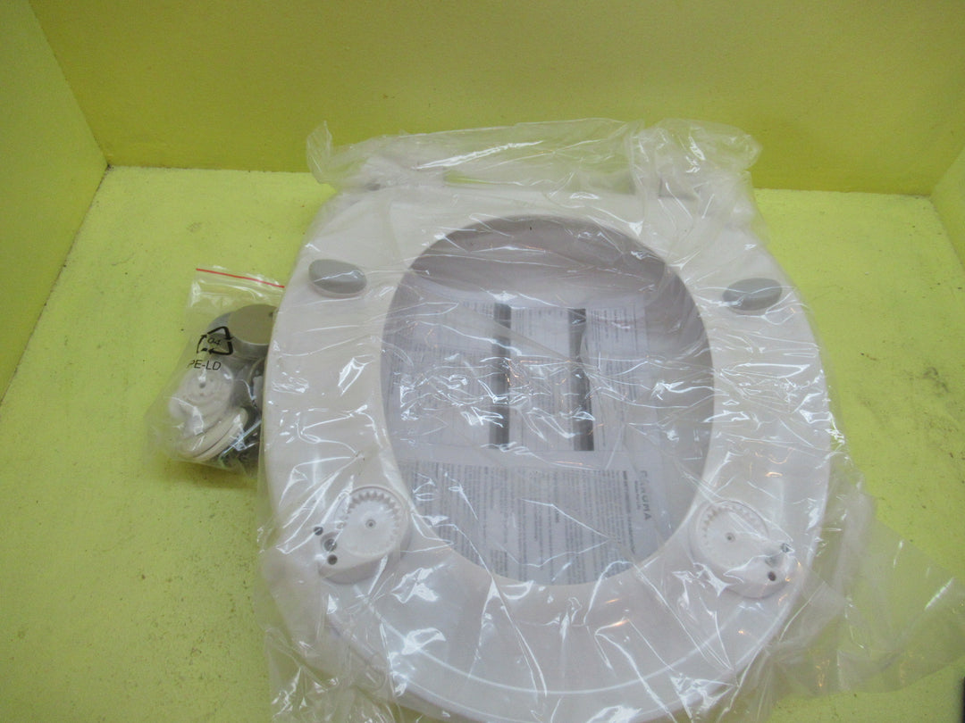 Brand New Caroma Toilet Seat with Fittings 65H x 44D  x 36.5W