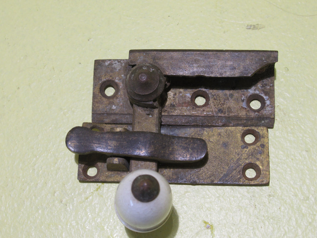 Brass and Porcelain Fitch Fastener   70L x 25W