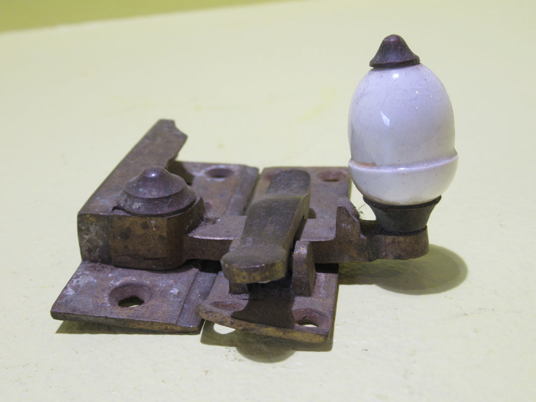 Brass and Porcelain Fitch Fastener   70L x 25W