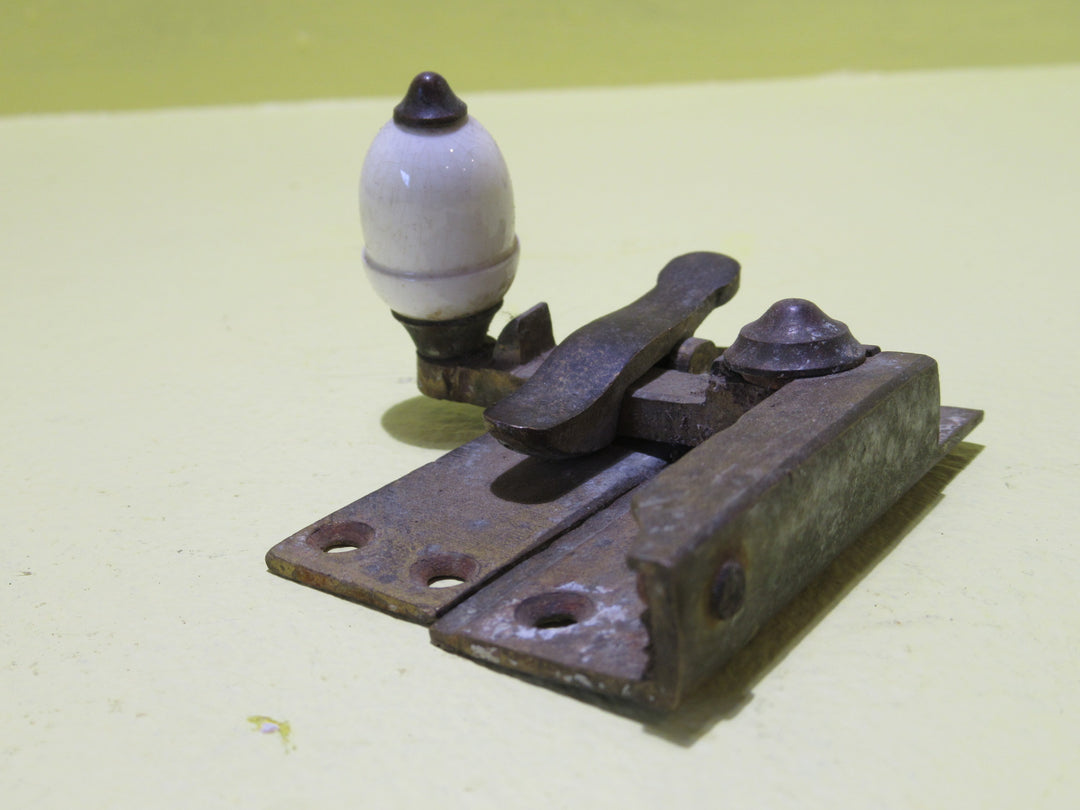 Brass and Porcelain Fitch Fastener   70L x 25W