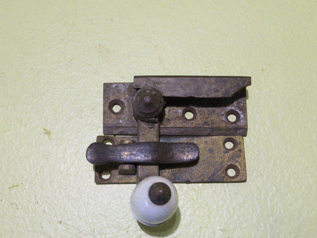 Brass and Porcelain Fitch Fastener   70L x 25W