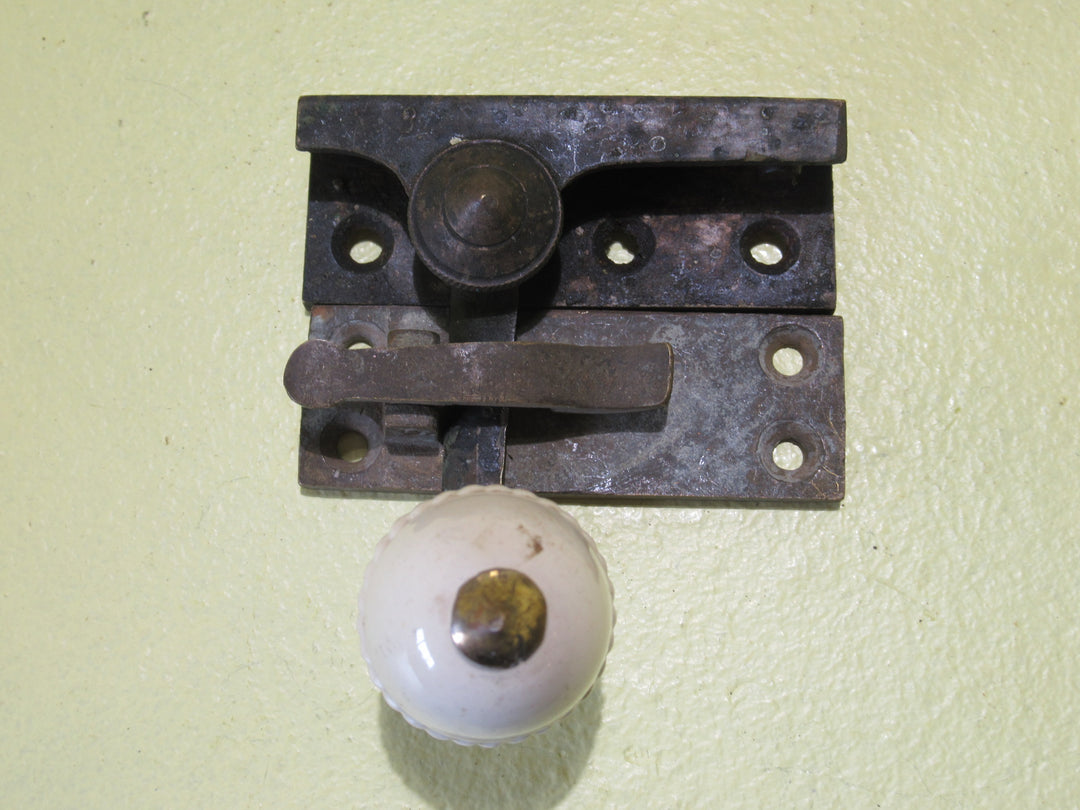 Brass and Porcelain Fitch Fastener   70L x 25W