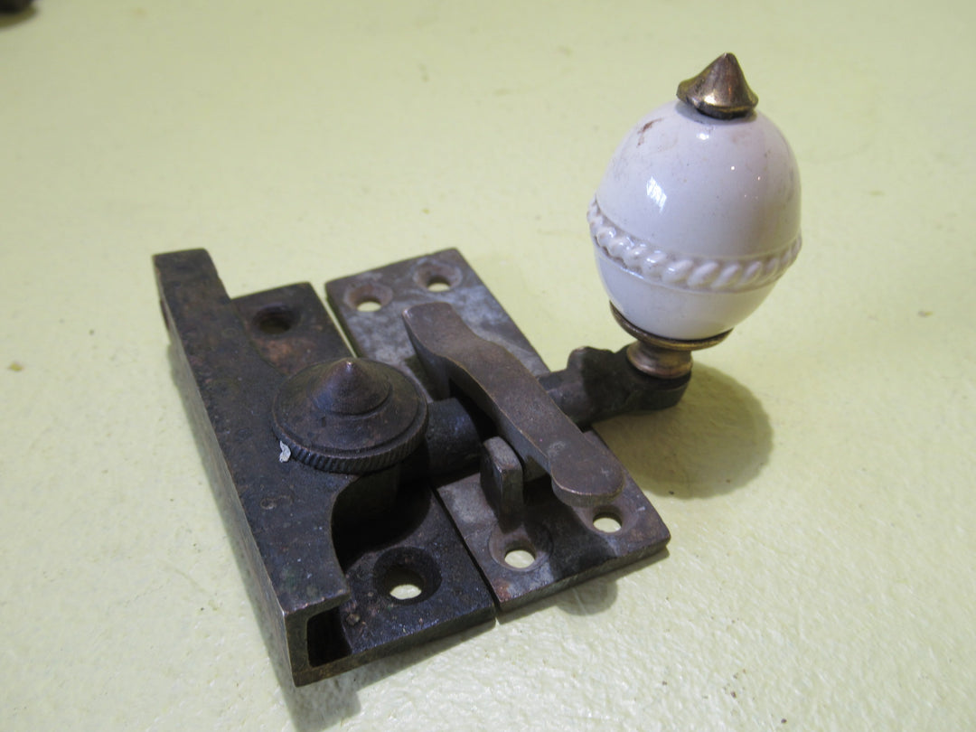 Brass and Porcelain Fitch Fastener   70L x 25W