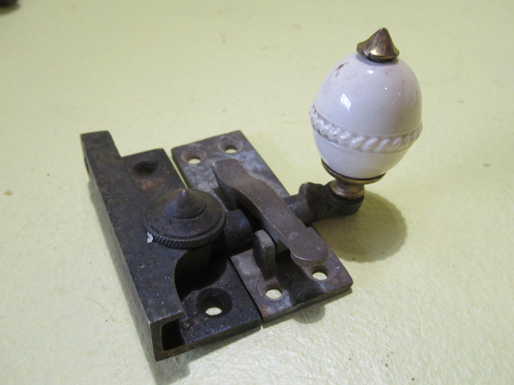 Brass and Porcelain Fitch Fastener   70L x 25W