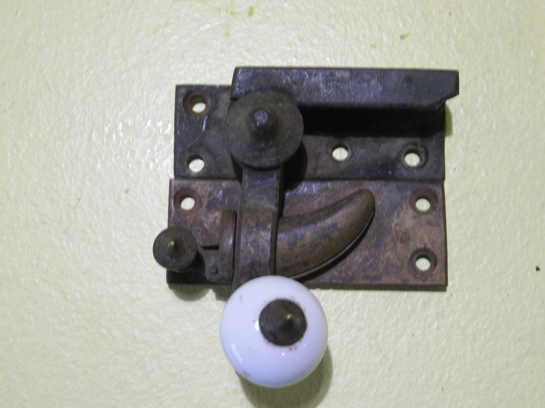 Brass and Porcelain Fitch Fastener   70L x 25W