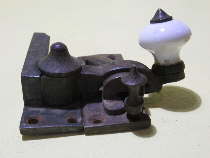 Brass and Porcelain Fitch Fastener   70L x 25W