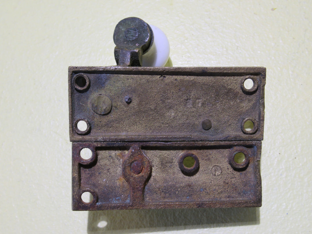 Brass and Porcelain Fitch Fastener   70L x 25W