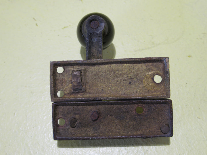 Brass and Porcelain Fitch Fastener   70L x 25W