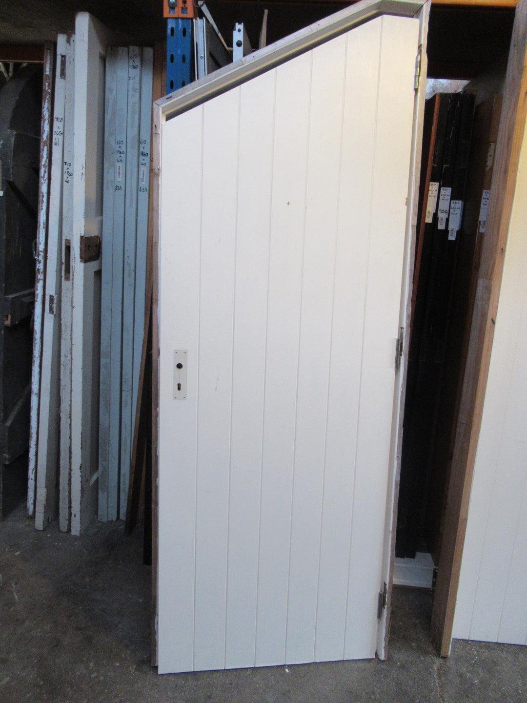 Funky Angled Door with Frame (Door 710W x 1640.5H Low End x 1980H High End x 40D)  (Frame 7600W x 1680.5H Low End x 2040H High End