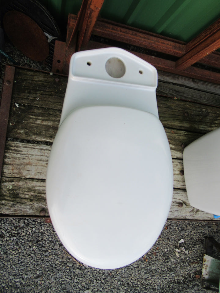 Toto Toilet  (430H x 380W x 630D) and Cistern (410H x 38W x 19D)