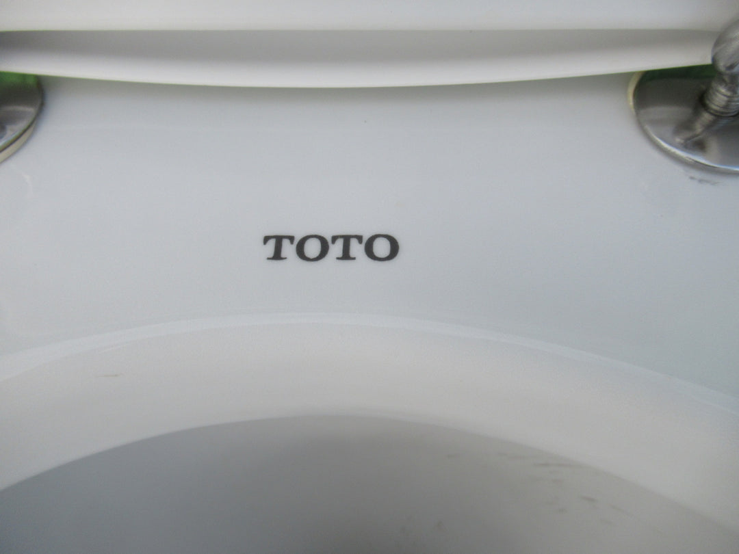 Toto Toilet  (430H x 380W x 630D) and Cistern (410H x 38W x 19D)
