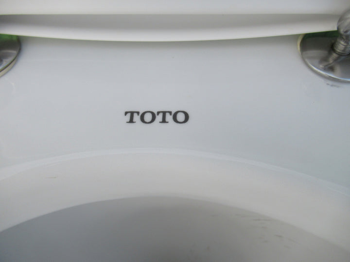 Toto Toilet  (430H x 380W x 630D) and Cistern (410H x 38W x 19D)