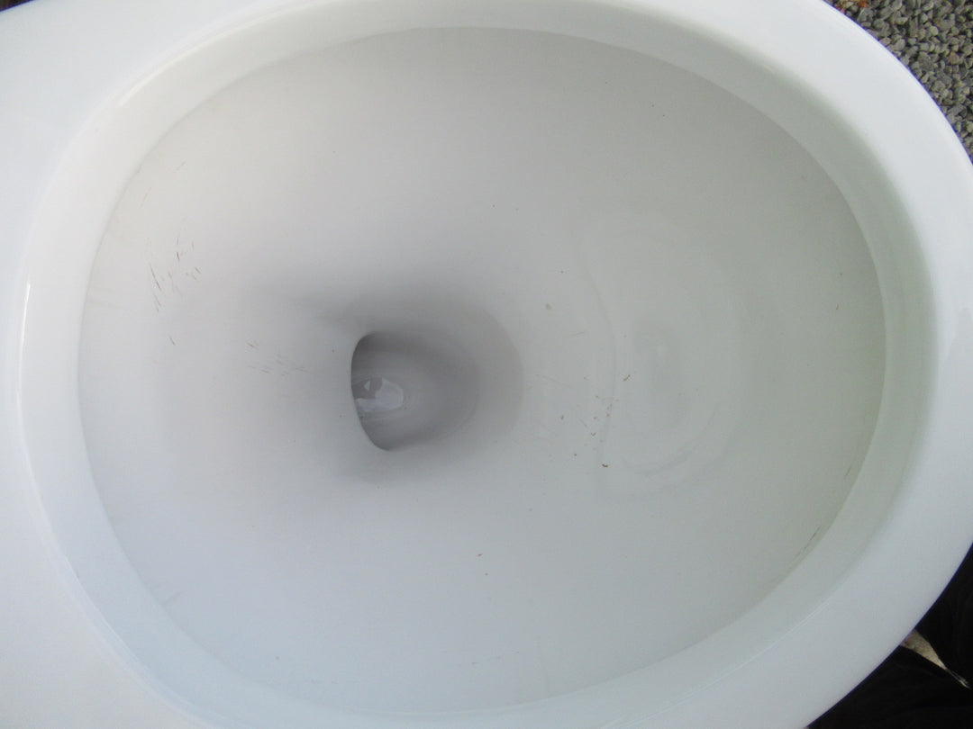 Toto Toilet  (430H x 380W x 630D) and Cistern (410H x 38W x 19D)