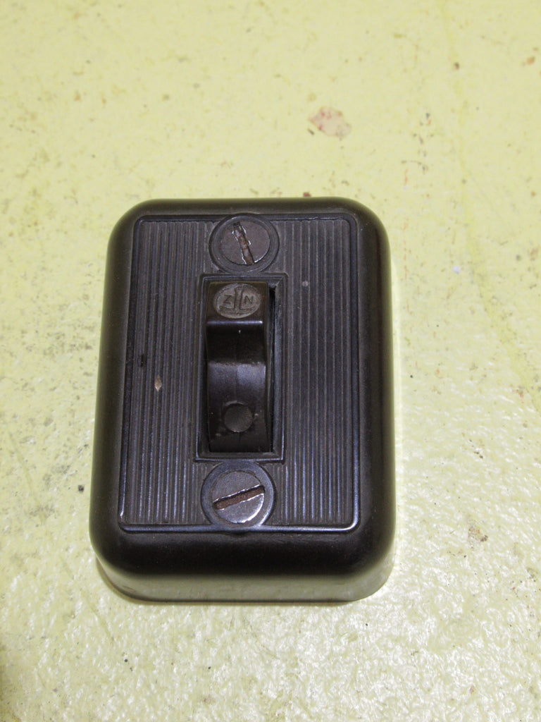 Small Brown Bakelite Rectangle Ribbed Light Switch 58H x 45W x 20D