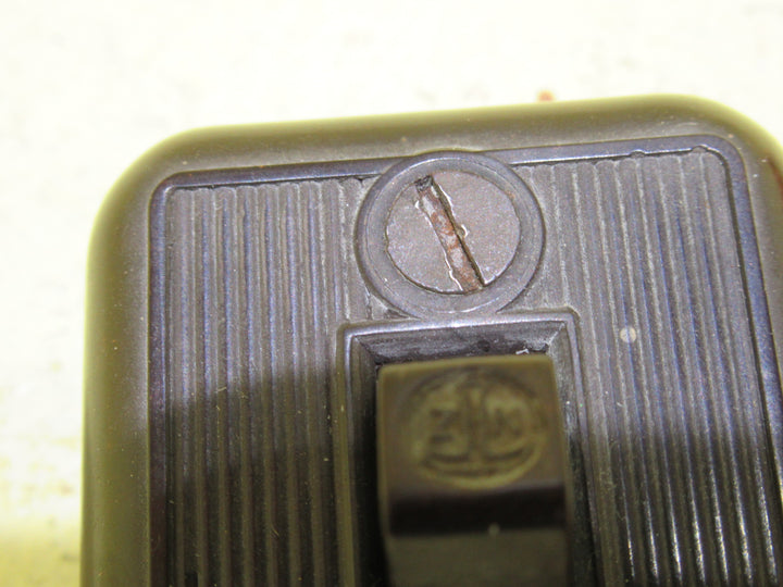 Small Brown Bakelite Rectangle Ribbed Light Switch 58H x 45W x 20D
