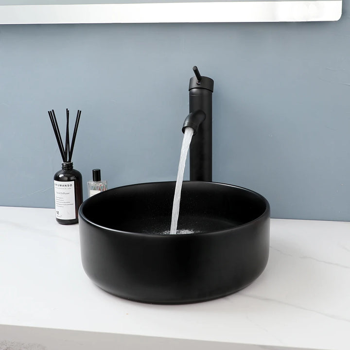 KEMAIDI Matte Black Bathroom Ceramic Washing Bowl Sink Above Counter Round Bathroom Sinks with Faucet Mixer Tap Set Deck Mounted