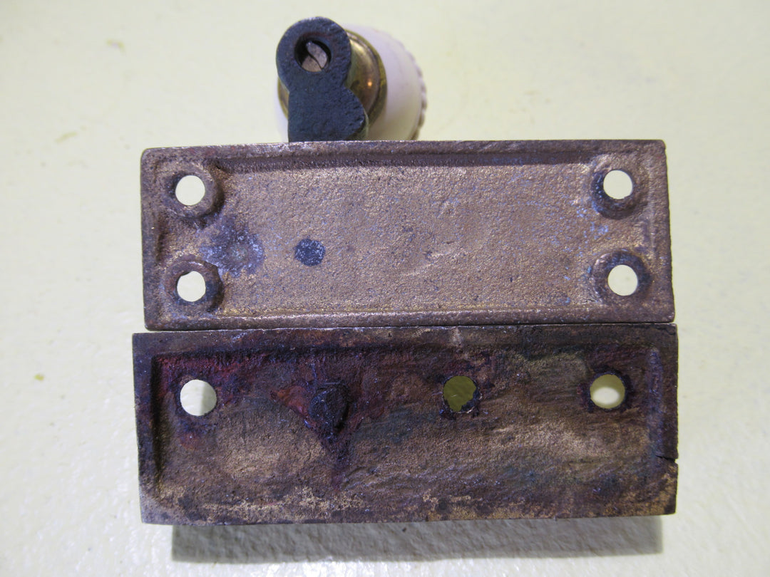 Brass and Porcelain Fitch Fastener   70L x 25W