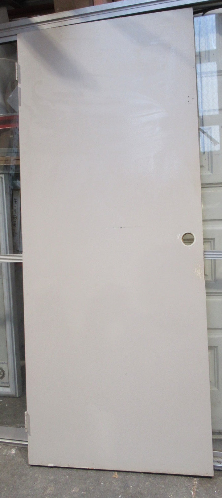 Off Grey Hollow Core Door with Large Handle Hole   1980H x 810W x 35D