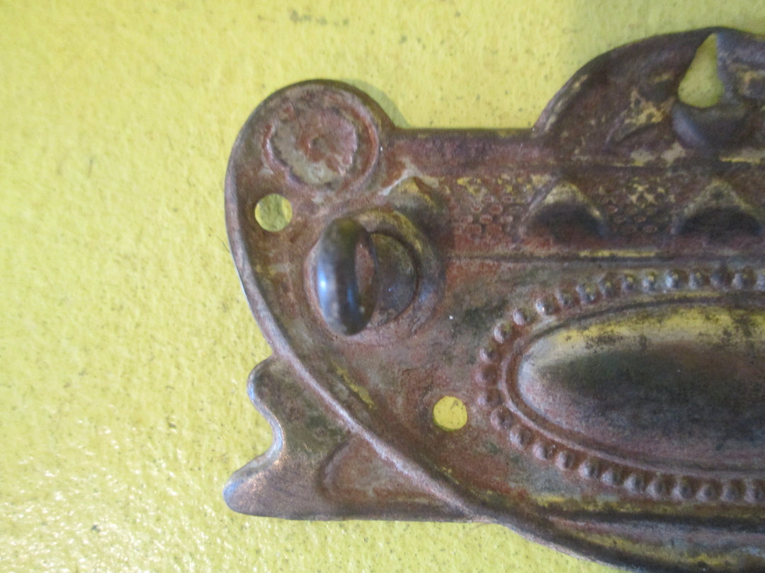 Pressed Brass With Oval Centre & Triangle Details 95L x 54W