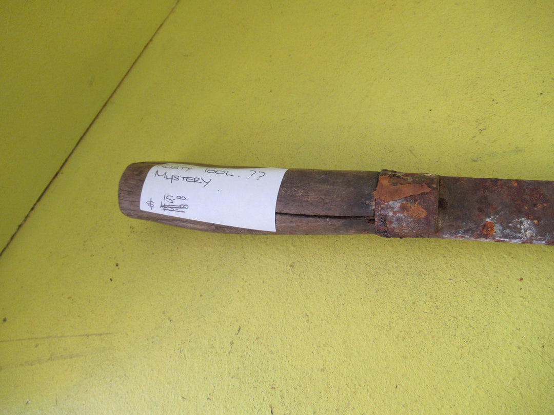 Old Fashioned Rusty Tool ??