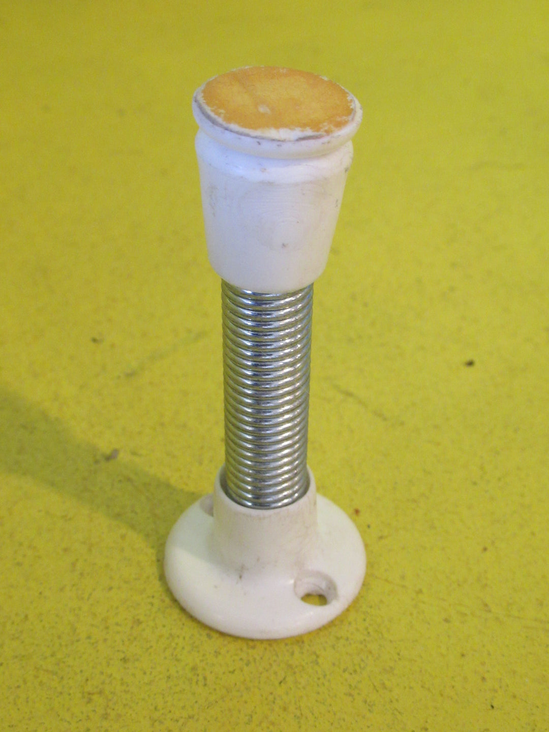 White Spring door Stop  75-80L x 40W