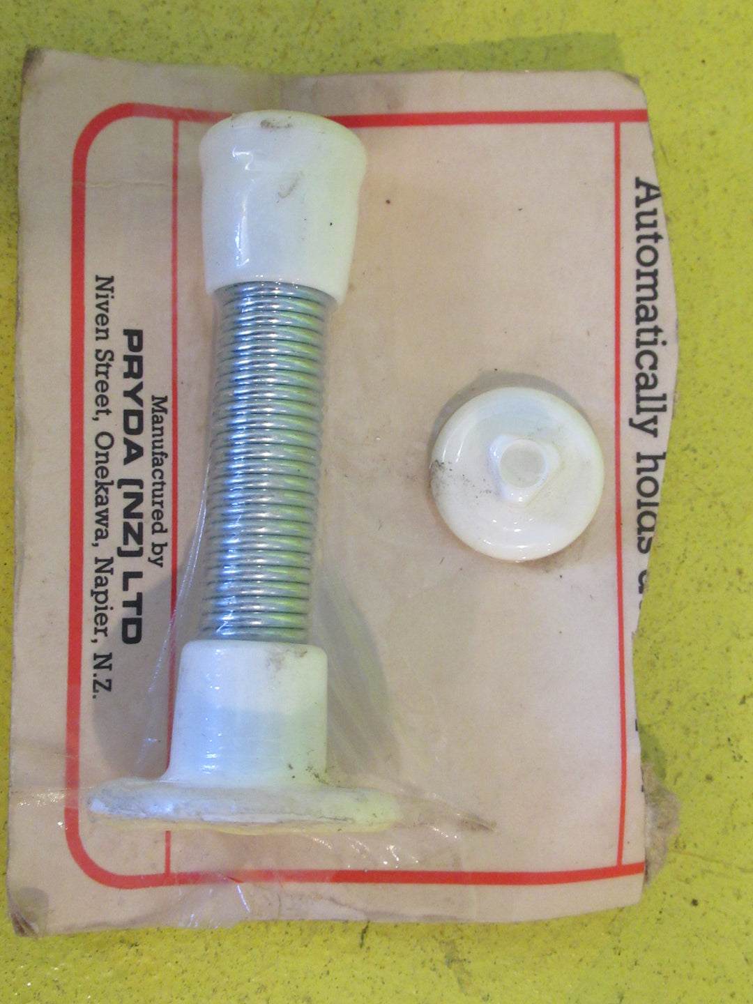 White Spring door Stop  75-80L x 40W