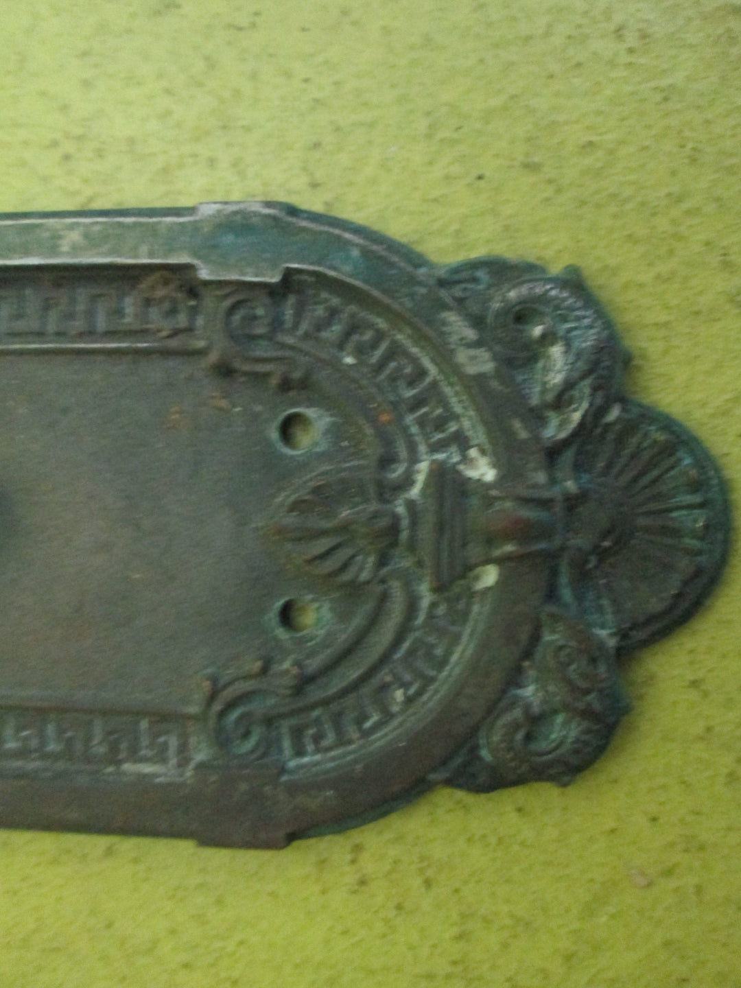 Bronze Ornate Door Plate with the Griffin Heading on the Plate