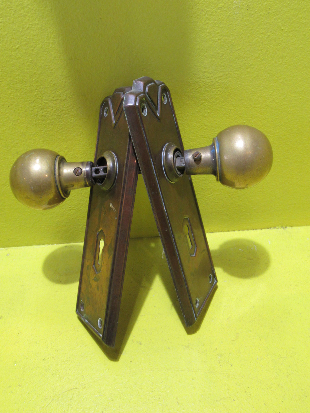 Art Deco Copper Plate with Raised Edge & Diamond Detail at the Top completed with Brass Ball Handles.   Plate 187L x 61W  Handle 45 Dia x 60H