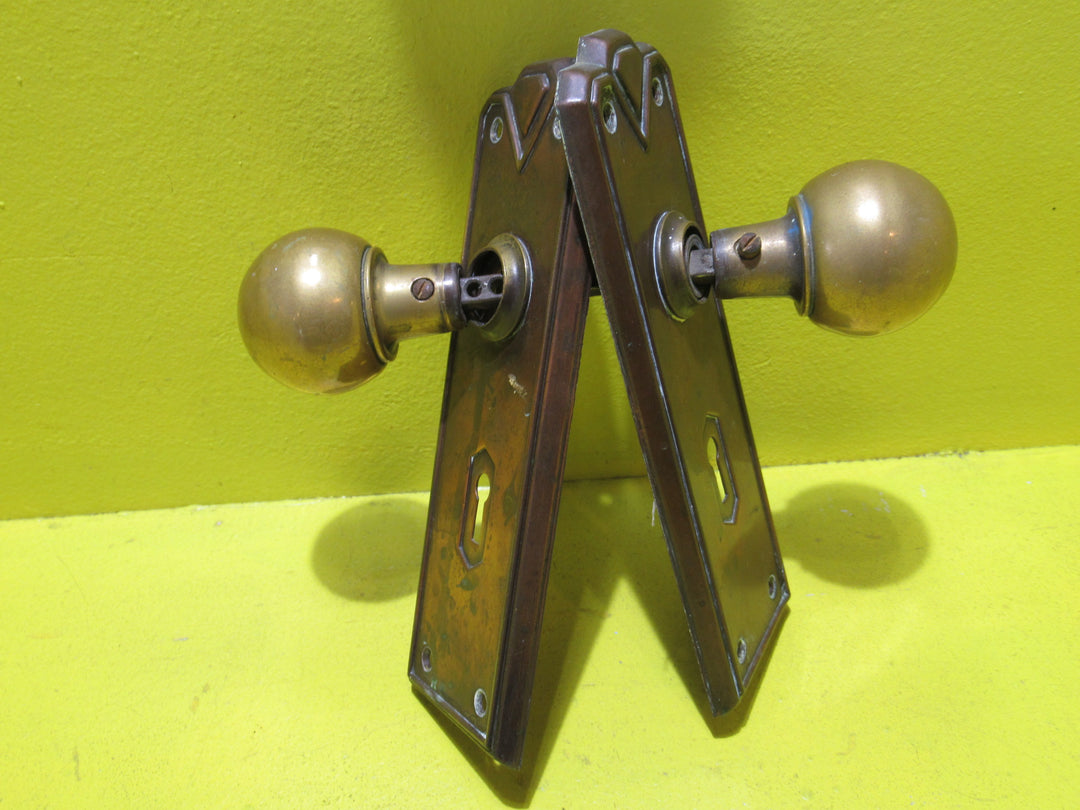 Art Deco Copper Plate with Raised Edge & Diamond Detail at the Top completed with Brass Ball Handles.   Plate 187L x 61W  Handle 45 Dia x 60H