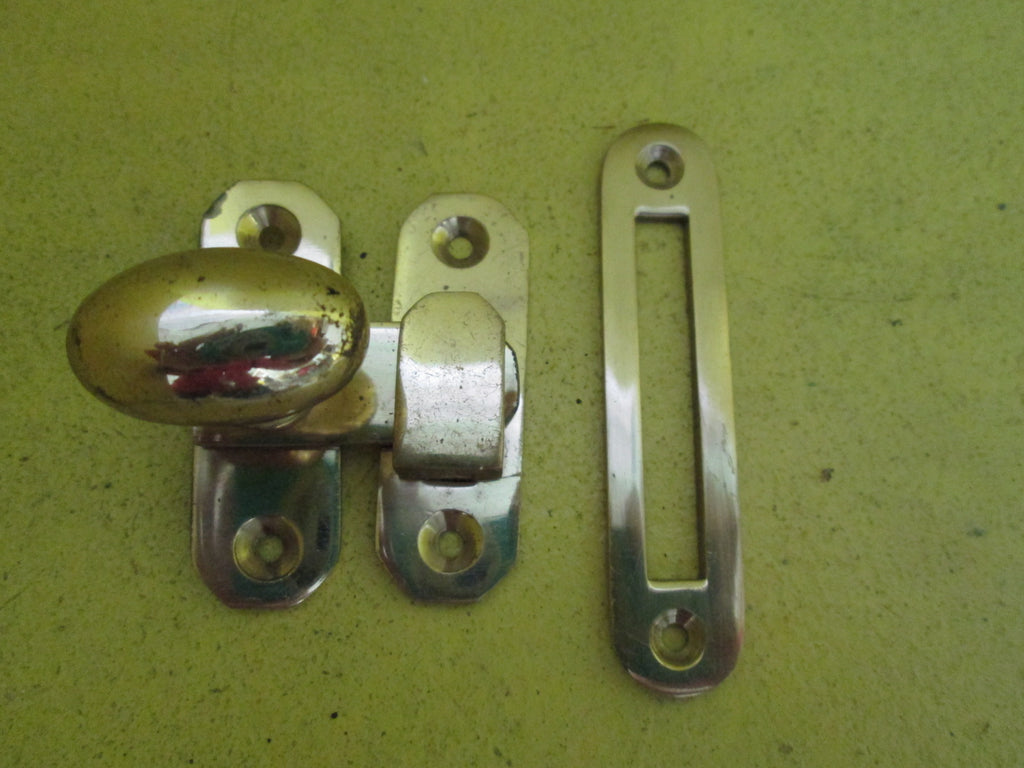 Oval Cupboard Catch -Polished Brass Knob 30-17D x 38H/Lever 45L/Plate and Fastener 58L x 18W