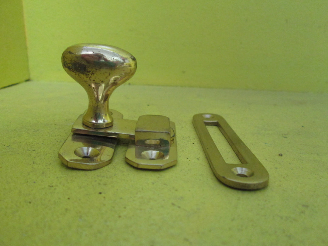 Oval Cupboard Catch -Polished Brass Knob 30-17D x 38H/Lever 45L/Plate and Fastener 58L x 18W